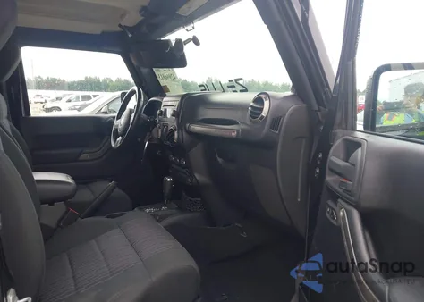 2012 Jeep Wrangler Sport z USA, uszkodzony, nr VIN 1C4AJWAG1CL243402